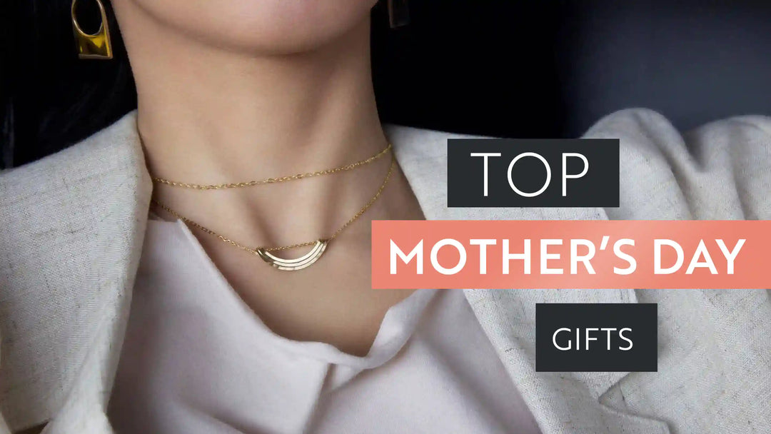 A woman wearing a gold necklace with an arch pendant. The words read TOP MOTHER'S DAY GIFTS