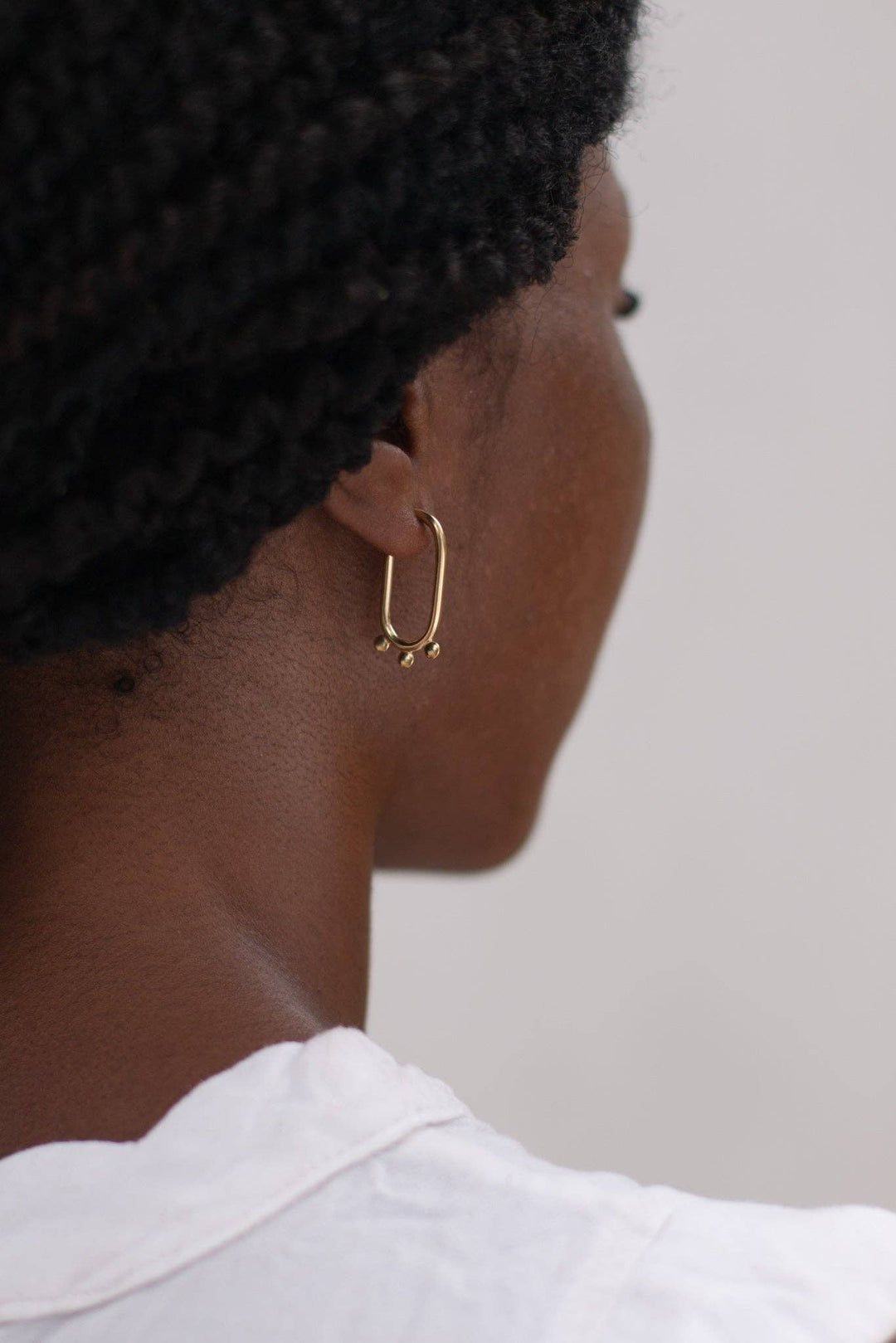made in malawi fair trade women owned business brass earrings