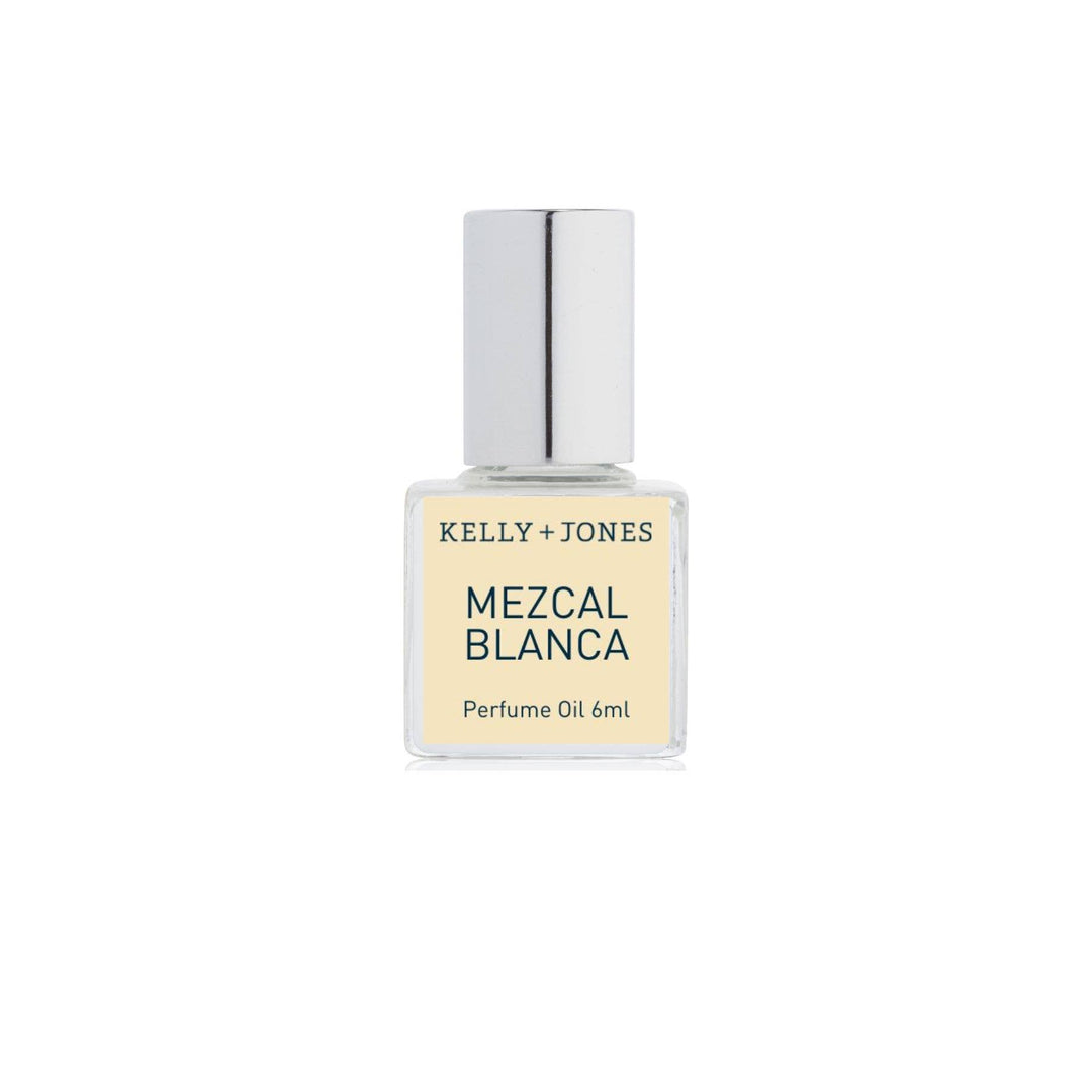 Perfume oil bottle labeled 'Mezcal Blanca' by Kelly + Jones on a white background