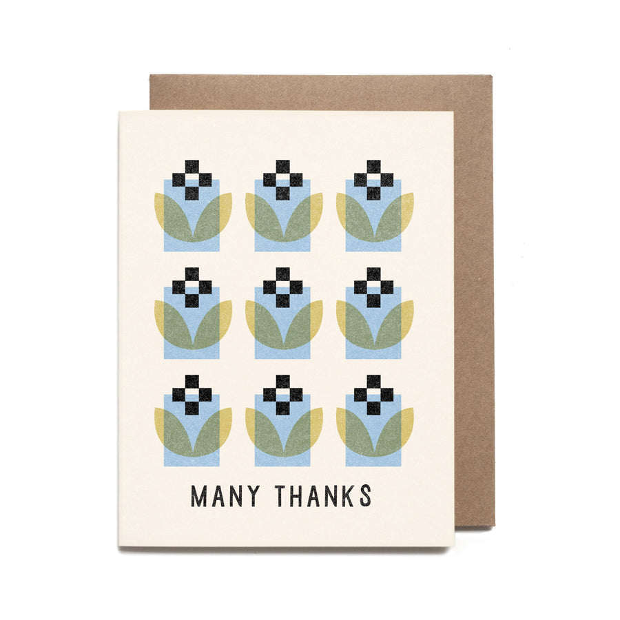 Greeting card with floral pattern and 'Many Thanks' text on a white background