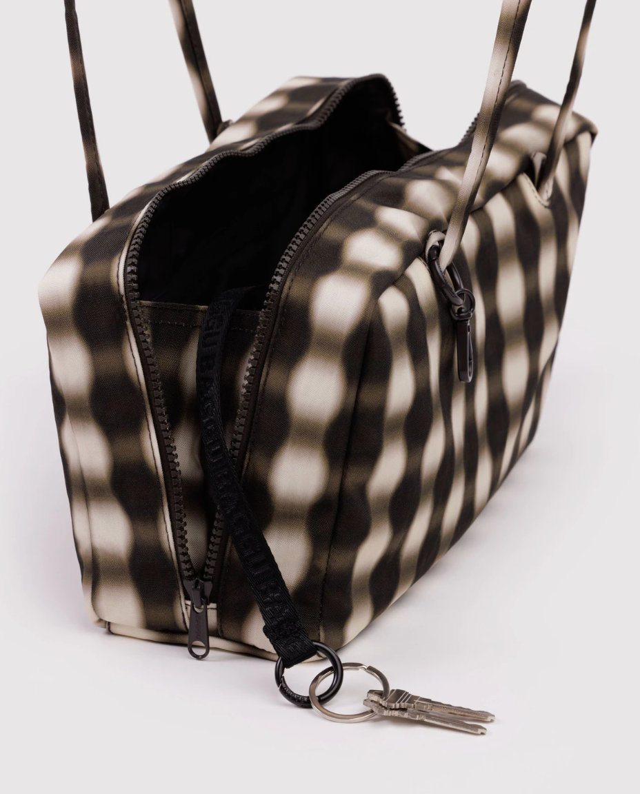 Nylon Bowler Bag Blurred Gingham Brown with keys attached to keychain against white backdrop