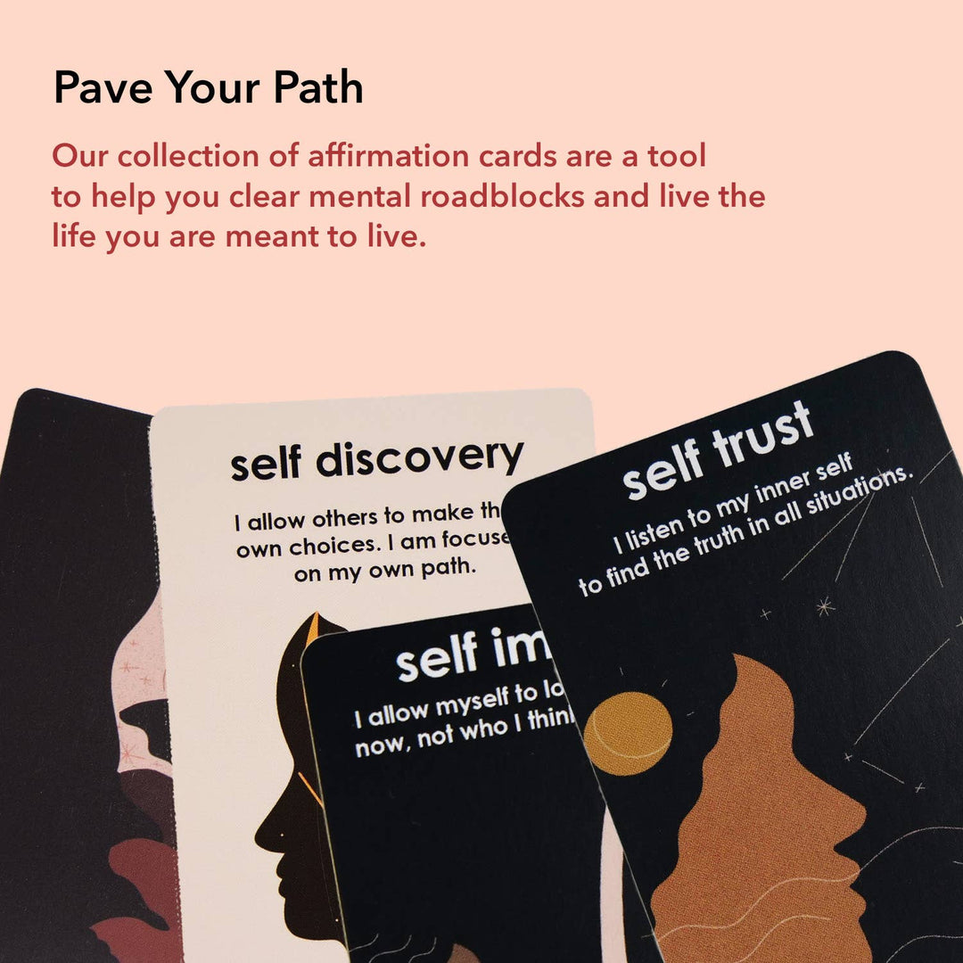 Collection of affirmation cards with motivational phrases on a pink background