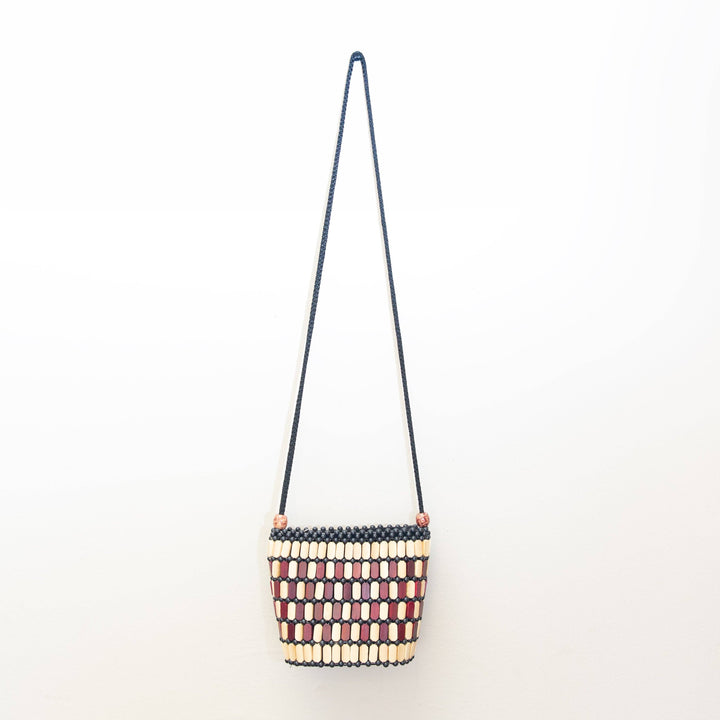 Beaded handbag with a strap on a white background