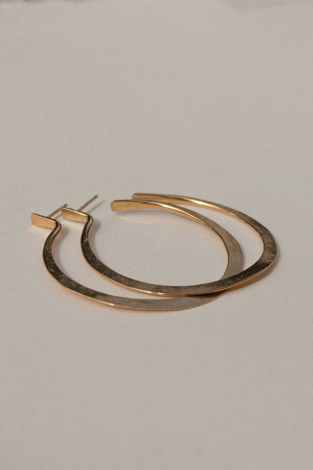 made in malawi These statement hoops feature a unique, textured design, yet are light enough for everyday wear. Make a bold statement without weighing you down with the Lenga Hoops.