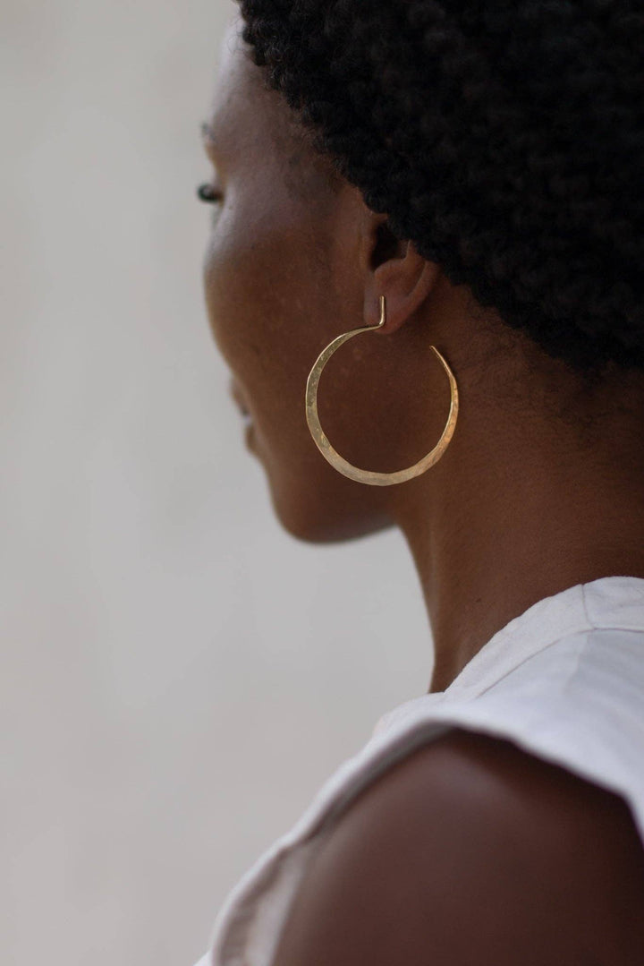 new origin shop curated women owned brands brass hoop earrings