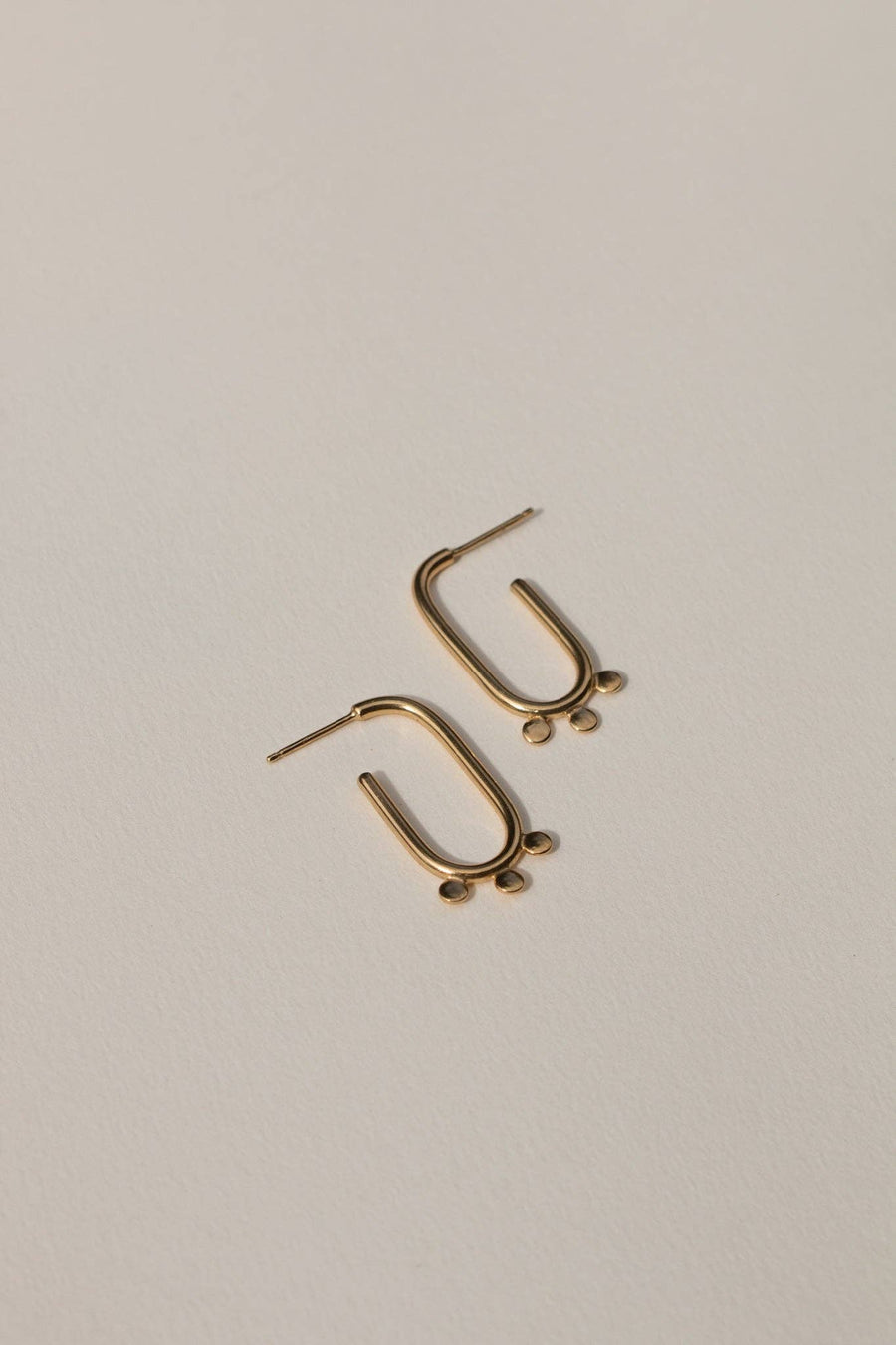 ‘Suzya' Earrings (meaning ‘Problem in Tumbuka) feature a minimal, yet striking design with three individual hand-cut discs that form together to create a contemporary hoop. Crafted from brass and sterling silver posts coated in a luxuriously thick layer of 14k recycled gold, the Suzya Earrings remind us that we can overcome any challenge that comes our way. austin small business