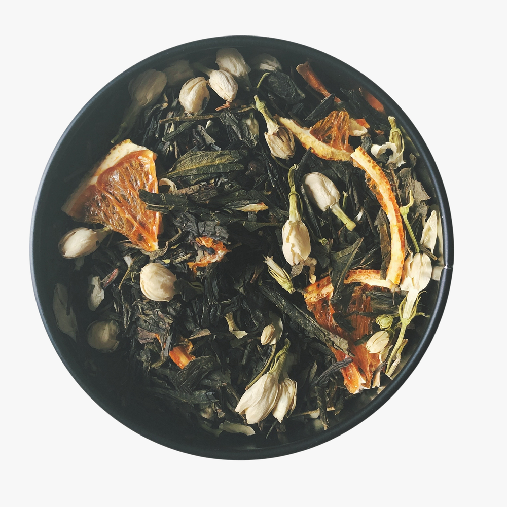 This fragrant green tea blend is curated to celebrate Adjourn's 1st birthday! It's filled with jasmine buds and petals, a smooth green tea, vanilla and orange slices dehydrated by hand. Light and airy, this blend is refreshing iced with light vanilla, citrus and floral notes. 