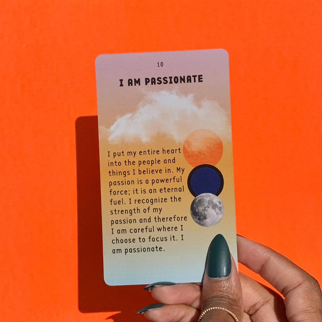 Card with 'I AM PASSIONATE' text and imagery held against an orange background