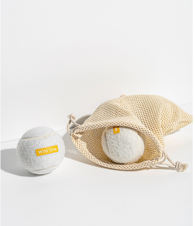 set of 4 white tennis balls