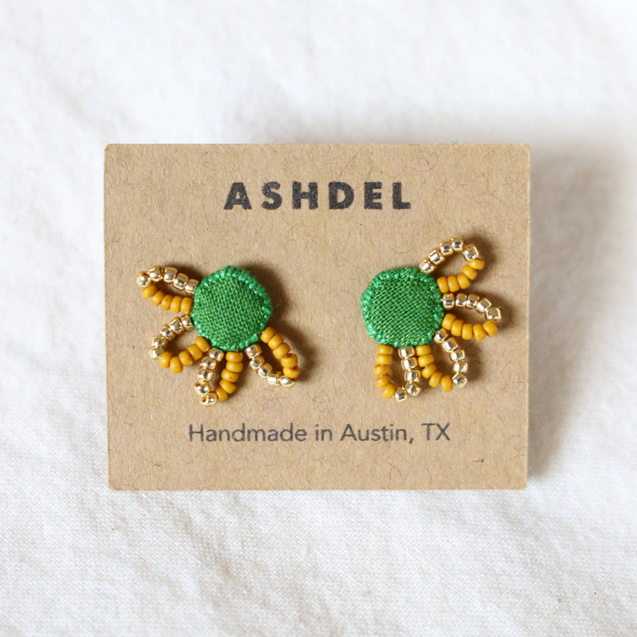 handmade in austin hand beaded earrings, green and gold 